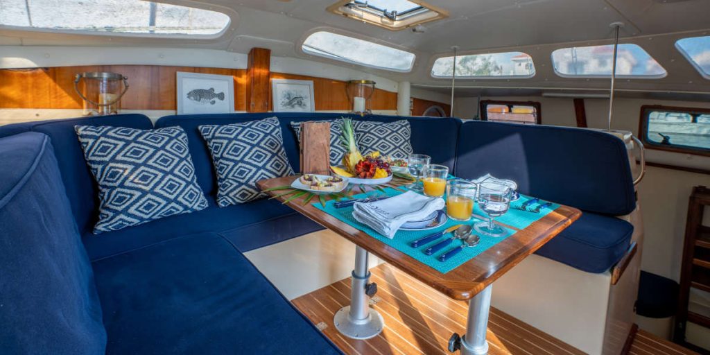 interior sofa of la yoya catamaran in riviera maya, mexico -Small Luxury Catamaran Rental