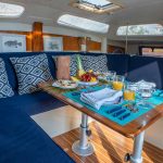 interior sofa of la yoya catamaran in riviera maya, mexico -Small Luxury Catamaran Rental