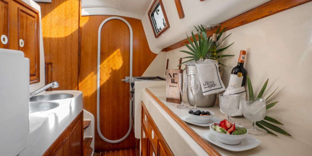 kitchenette of La Yoya catamaran for rent in playa del carmen, mexico - Small Luxury Catamaran Rental